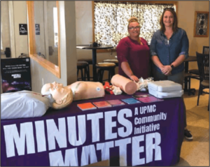 UPMC clinical staff at the Minutes Matter activation table during the Biz Night Out event on September 21, 2023. Hosted by the Kane Chamber of Commerce, this free educational event for local businesses officially launched Minutes Matter in the Kane community.