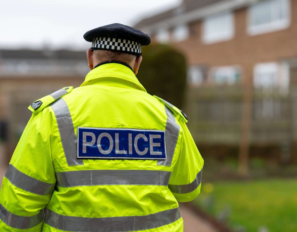 Police officer in a neon yellow shirt